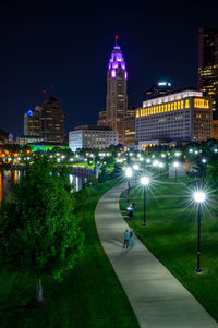 Illuminated buildings in city at night