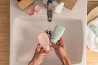 Cropped hand of person washing hands