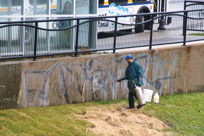 Full length of man walking in city