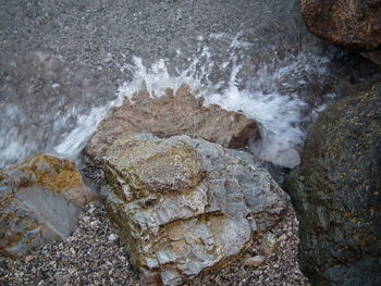 Close-up of stones on beach