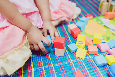 Close-up of girl playing with toy