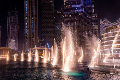 Burj khalifa skyscraper at night in dubai.