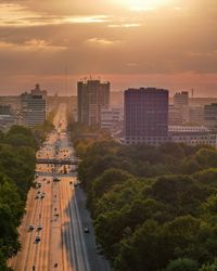 High angle view of buildings against sky during sunset