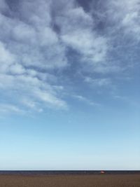 Scenic view of sea against blue sky