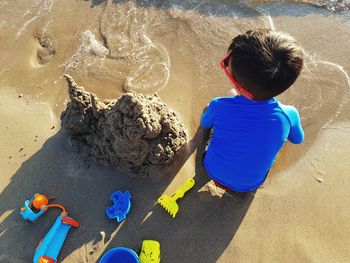 High angle view of boy at beach