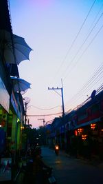 Street in city against clear sky