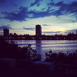 View of illuminated city at dusk