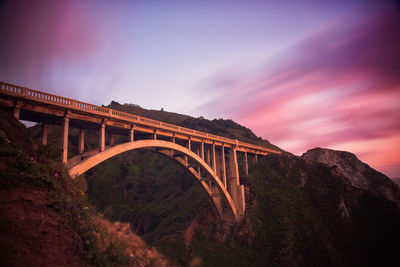 Arch bridge against sky