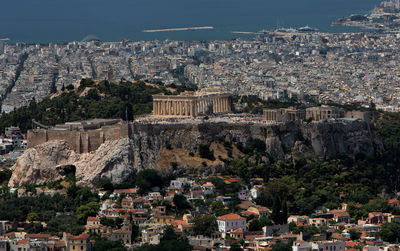 Old ruin amidst buildings in city