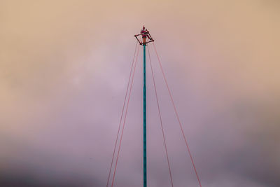 Low angle view of sailboat against sky during sunset