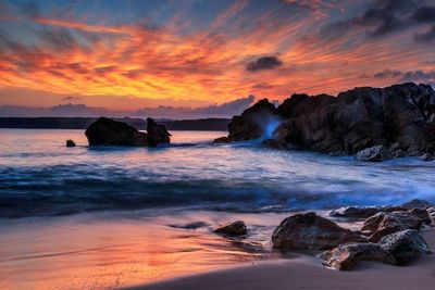 Scenic view of sea against sky during sunset