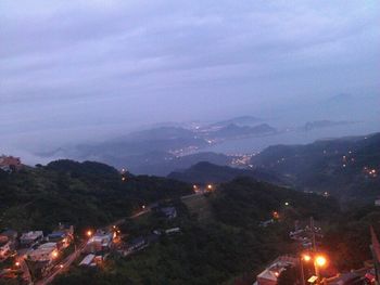 View of illuminated city at night