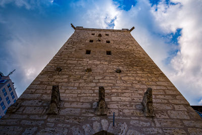 Low angle view of historical building against sky