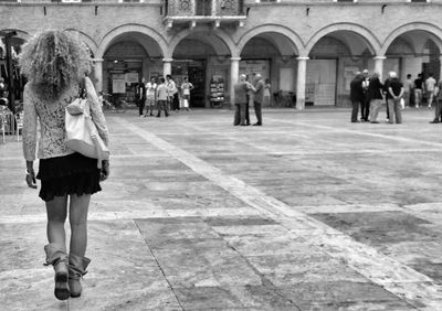 Woman standing in city