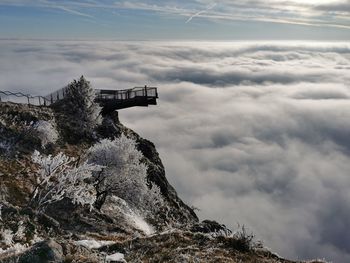 Low angle view of snowcapped mountain against sky