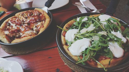 High angle view of pizza in bowl on table