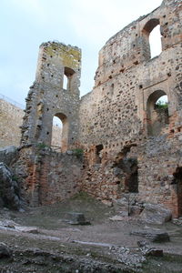 Low angle view of old building against sky