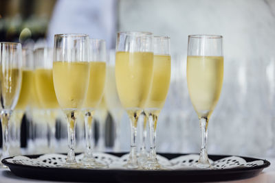 Man is pouring red or white wine in social event like weddings business gathering or romantic dinner