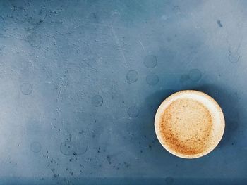 Directly above shot of cappuccino on table