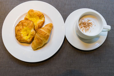 Close-up of breakfast served on table