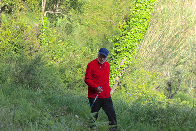 Full length of man walking on field