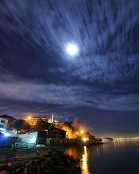 Illuminated cityscape at night