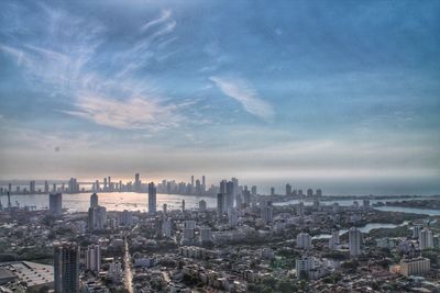 High angle view of buildings against sky in city