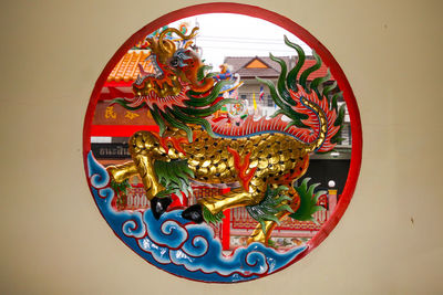 Close-up of multi colored art on wall