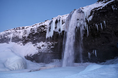 Seljalandfoss waterfall in winter landscape, iceland