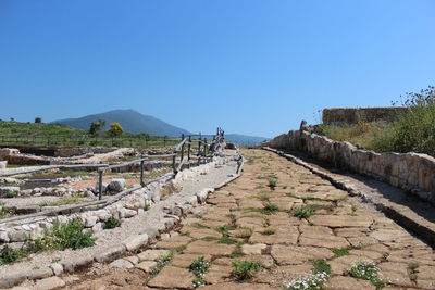 Panoramic view of landscape against clear blue sky