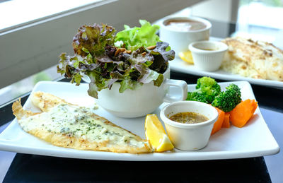 High angle view of meal served on table