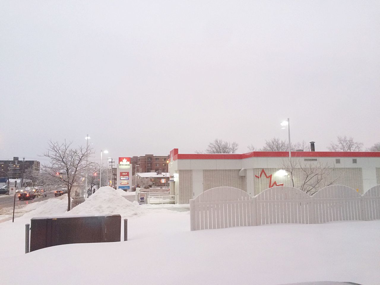 snow, winter, cold temperature, building exterior, season, architecture, built structure, weather, clear sky, covering, copy space, house, frozen, white color, residential structure, bare tree, field, outdoors, fence, sky