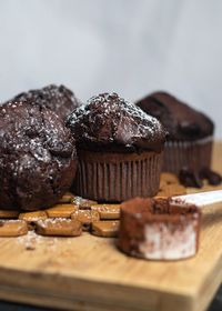 Close-up of chocolate cupcake or muffin on cutting board