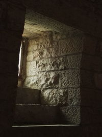 Low angle view of stone wall in old building