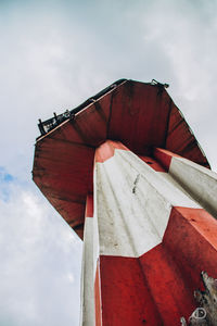 Low angle view of bell tower against sky