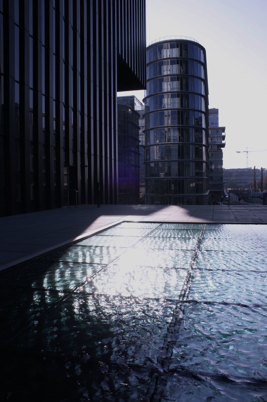 REFLECTION OF BUILDING IN CITY