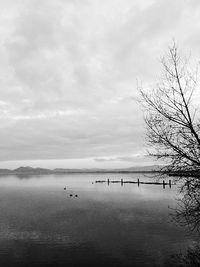 Scenic view of sea against cloudy sky