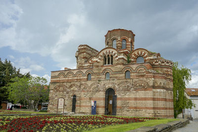 Low angle view of old building against sky