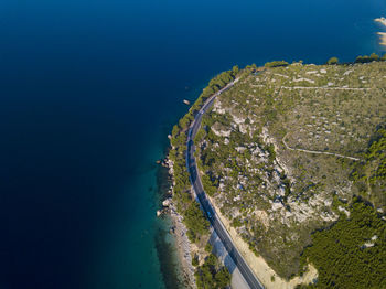 High angle view of beach against blue sky