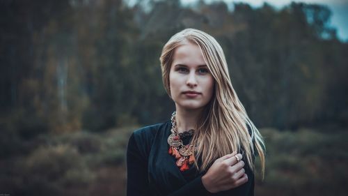 Portrait of a young woman outdoors