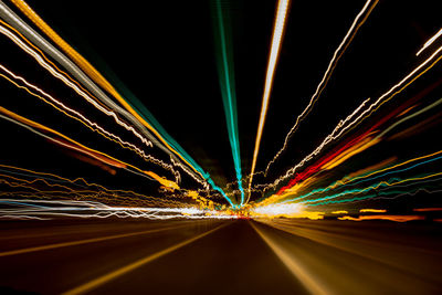 Light trails on road at night