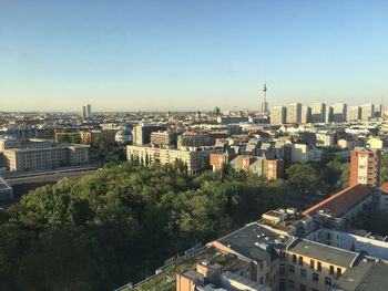 High angle view of buildings against clear sky