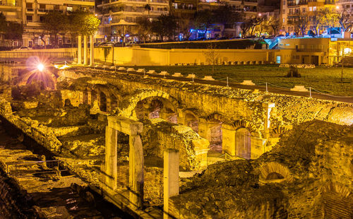 High angle view of illuminated buildings at night