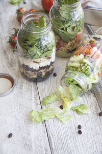 High angle view of chopped vegetables in glass on table