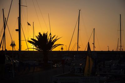 Silhouette of marina at sunset