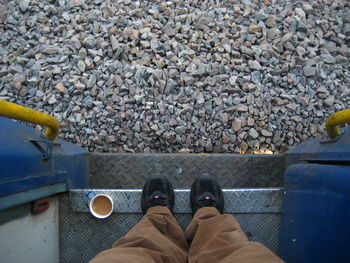 Low section of man standing on floor