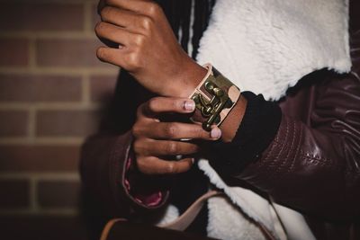 Close-up of man wearing wristband