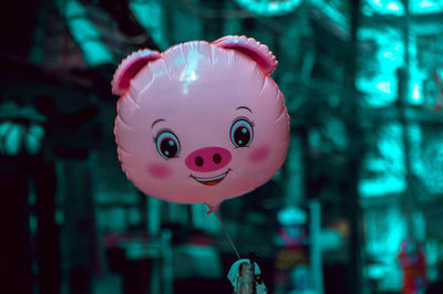 Close-up of stuffed toy hanging on tree