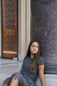 Young girl rests sitting after the walk in istanbul