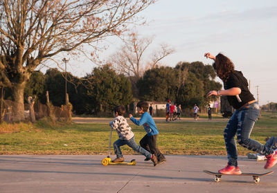 Children skating in the park